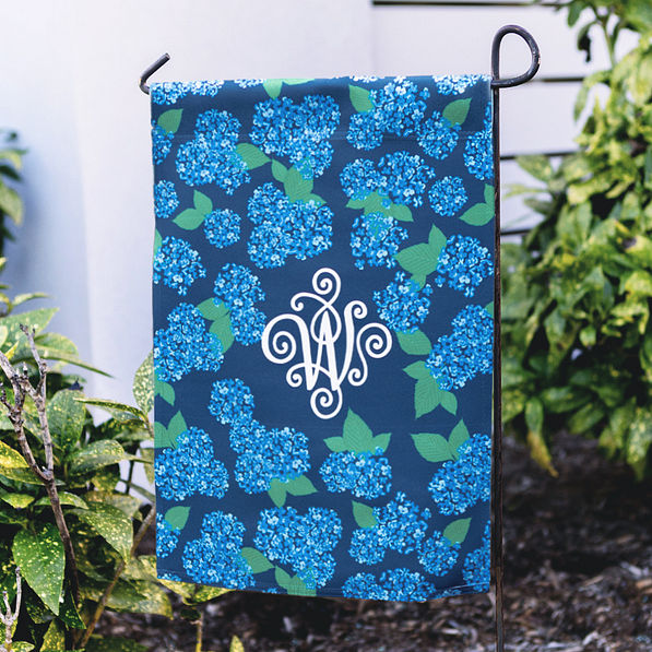 blue hydrangea spring garden flag up close