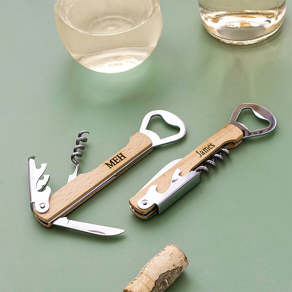 duo wine bottle openers on green background