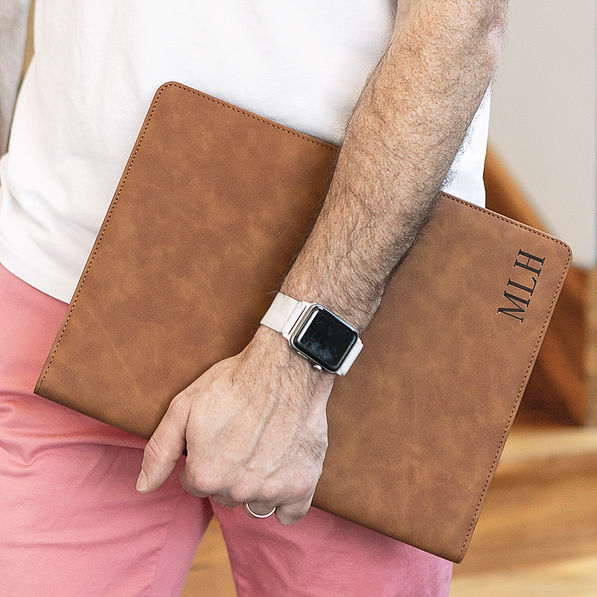 guy carrying personalized portfolio