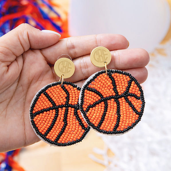basketball personalized earrings in hands