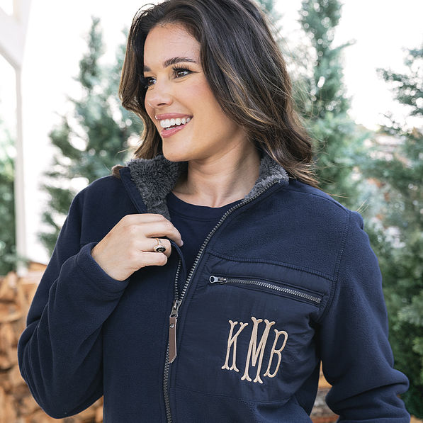 close up of monogrammed navy field fleece jacket