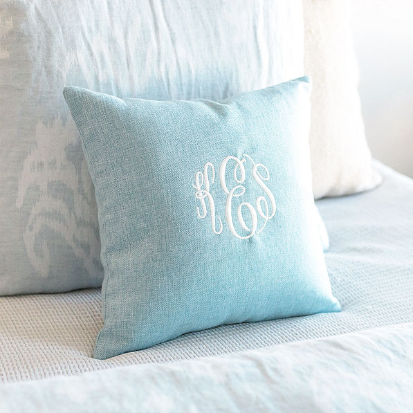 light blue linen pillow case on bedding