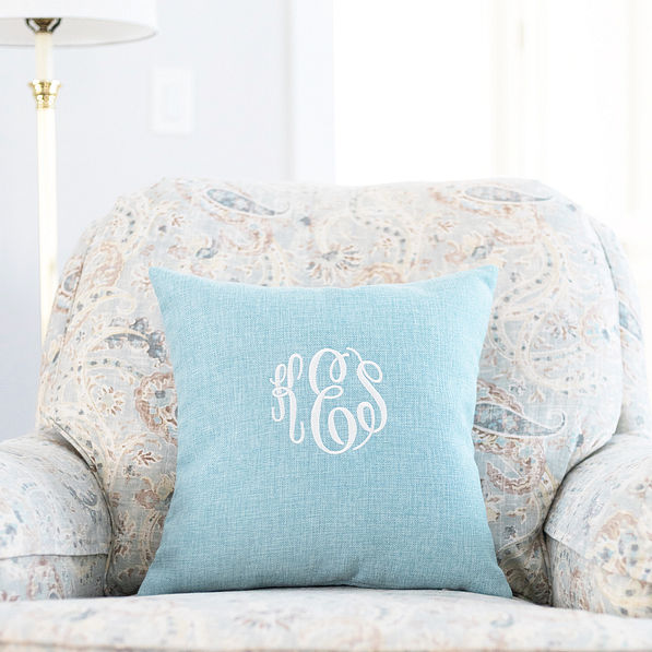 light blue linen pillow case on chair