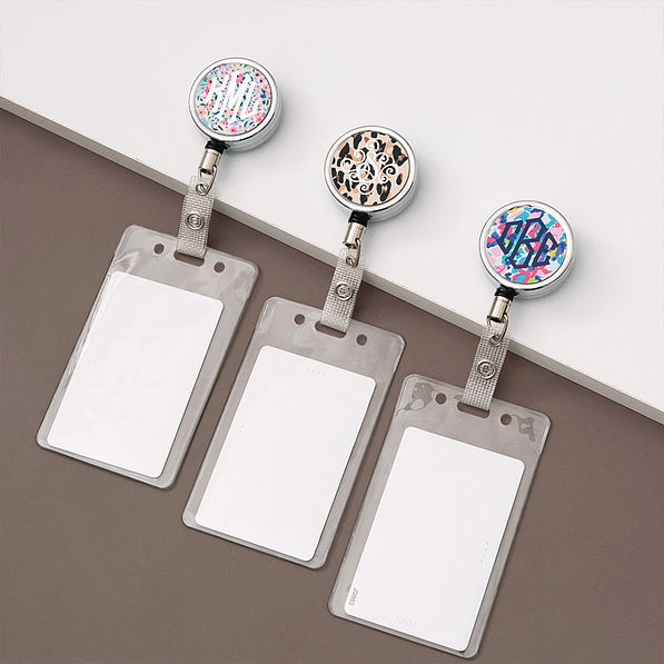3 set badge reels in a line