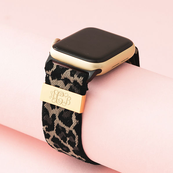 leopard monogrammed smart watch band on pink background