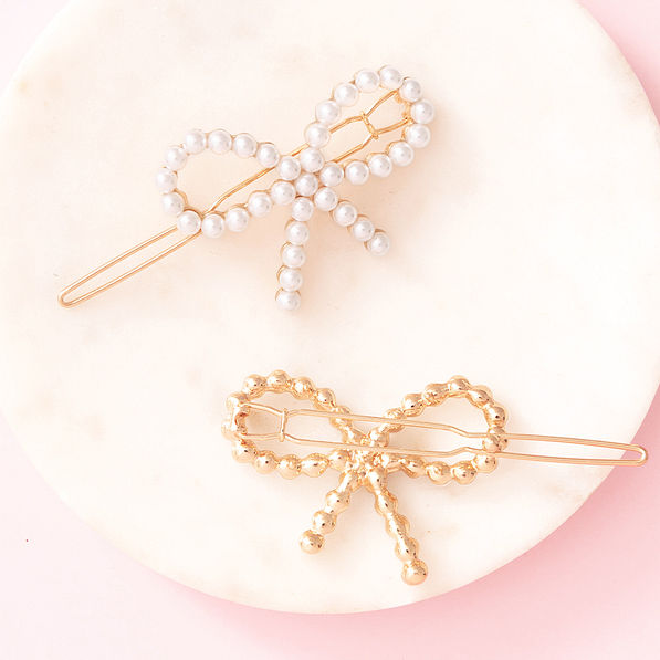 front and back of pearl bow barrettes