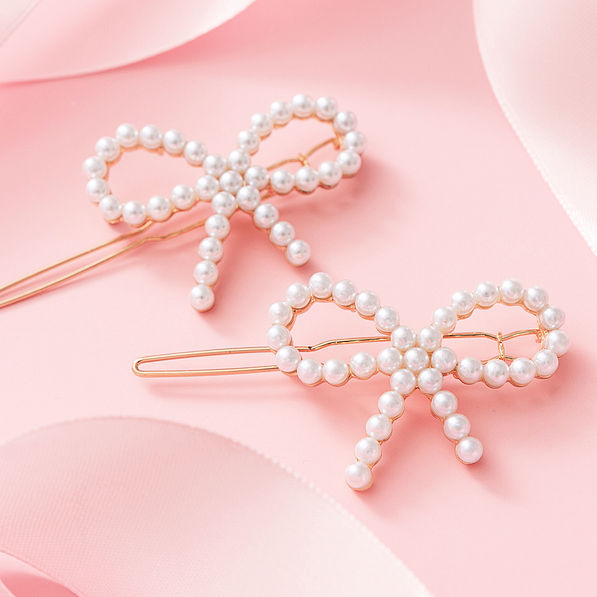 pearl bow barrettes up close