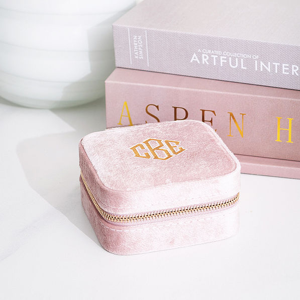 velvet travel jewelry case in blush with books