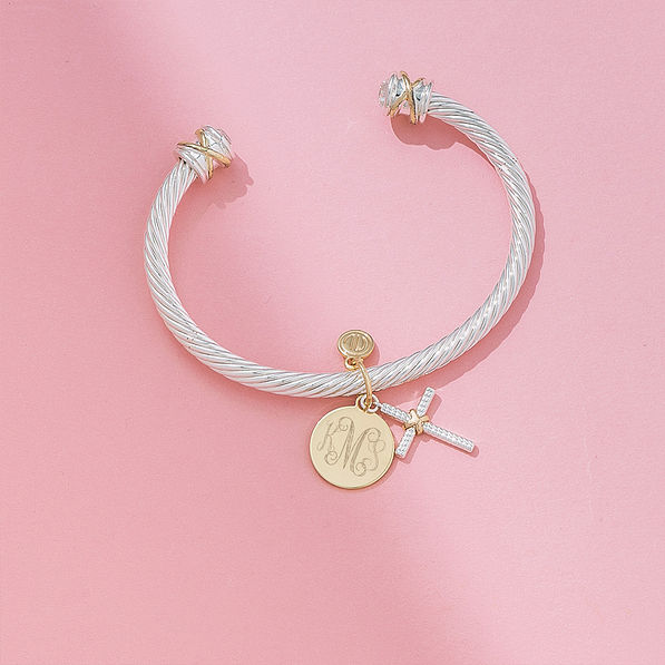 cable cross bracelet on pink