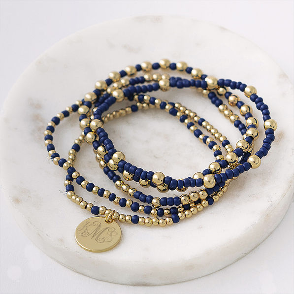 Navy gameday bracelet stack on tray