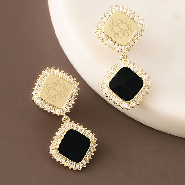 personalized gold elevated dangle earrings on marble