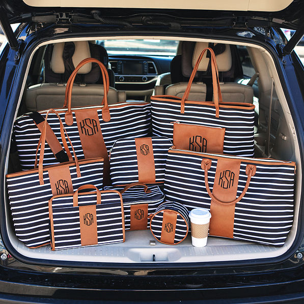 black and white striped collection in trunk of car