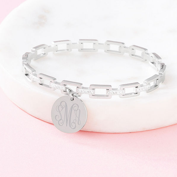 silver pave chainlink bangle on marble dish