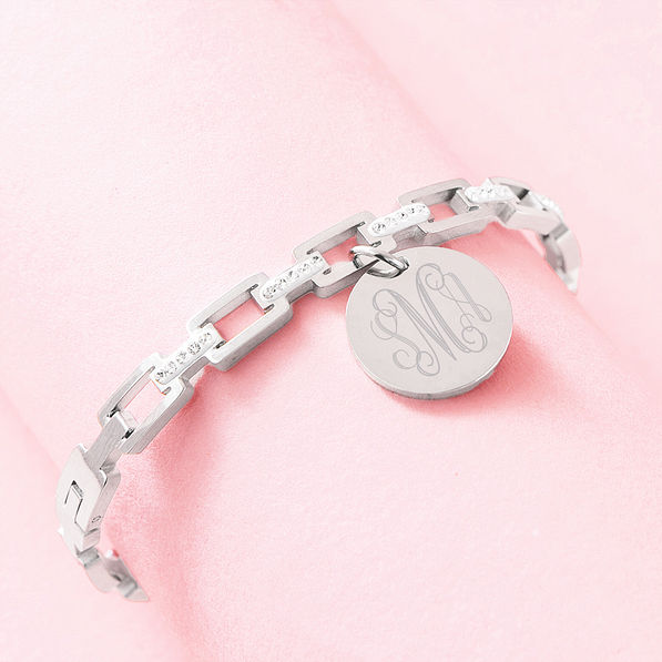 silver pave chainlink bangle on pink background