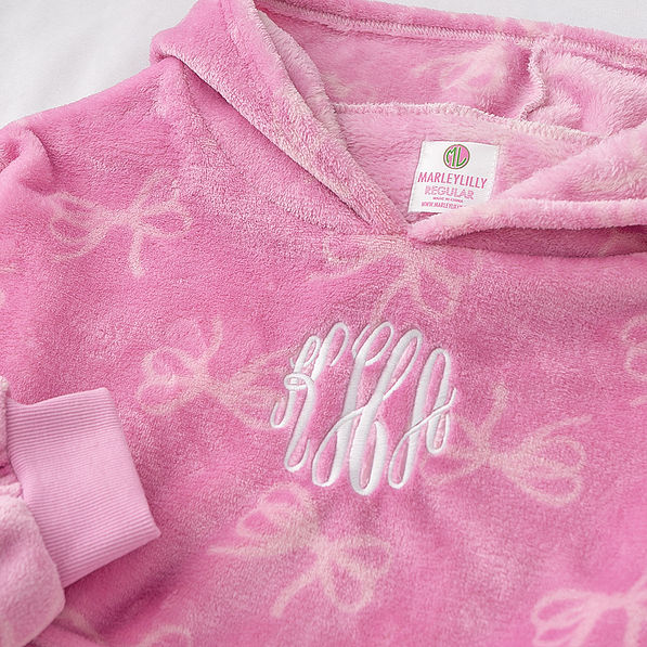 close up of pink bows xl blanket hoodies monogram