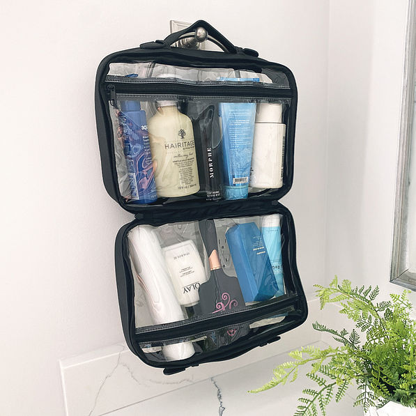 inside of black clear toiletry bag