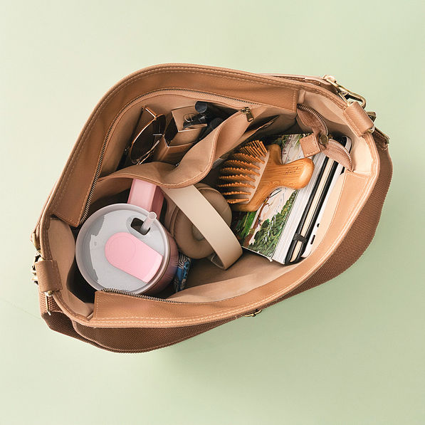 inside of brown whipstitch hobo purse