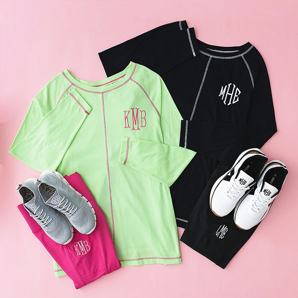 black and lime athleisure layering tee flatlay