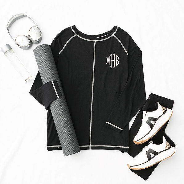 black athleisure layering tee flatlay