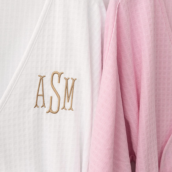 pink and white scalloped robes detail shot