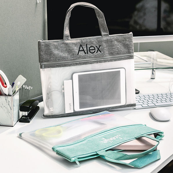 monogrammed reusable storage bag in charcoal and mint in office