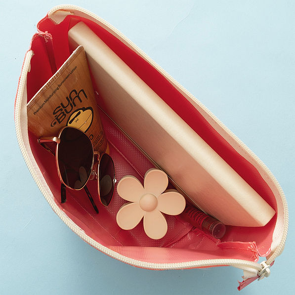 inside of coral monogrammed waterproof cosmetic pouch