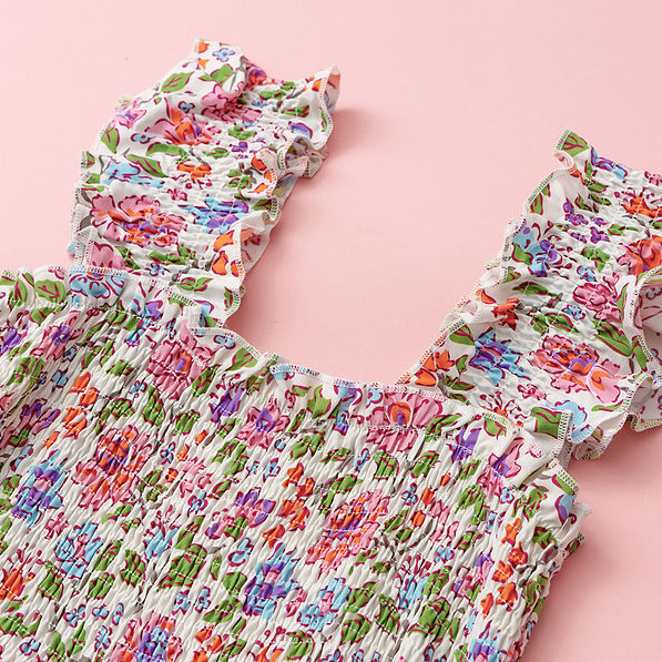 up close of smocked dress in flora trellis