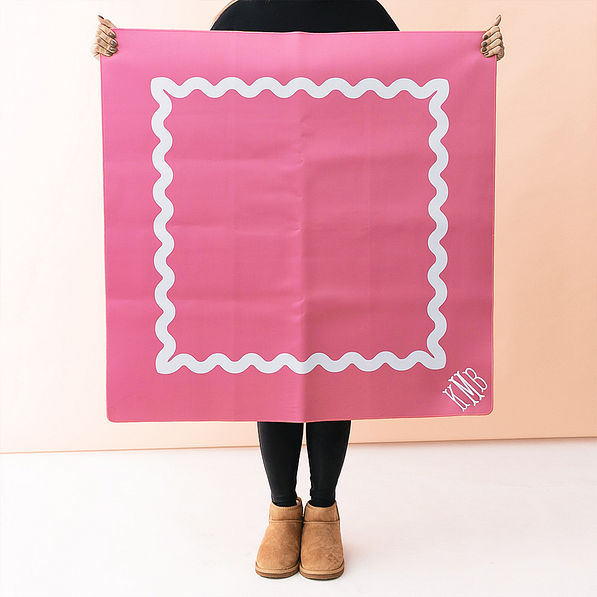 Girl holding up mahjong mat