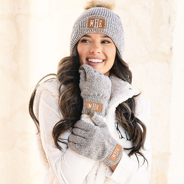 girl wearing heathered brown monogrammed beanie and gloves