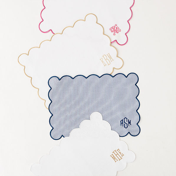 group of 4 scalloped placemats