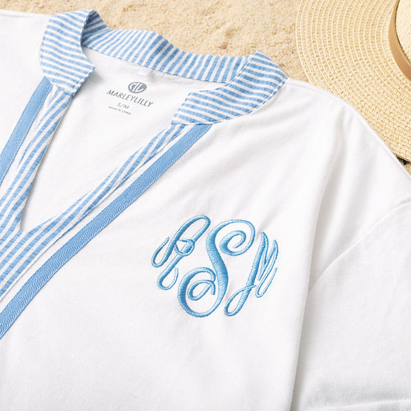 close up of monogrammed seersucker accent cover up