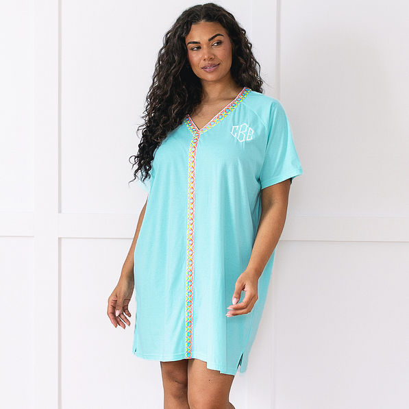 girl wearing ocean monogrammed accent cover up