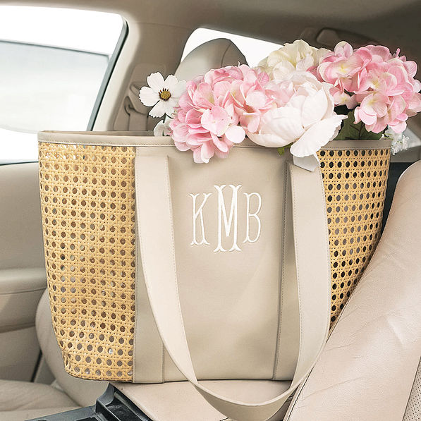 monogrammed caning tote bag in car
