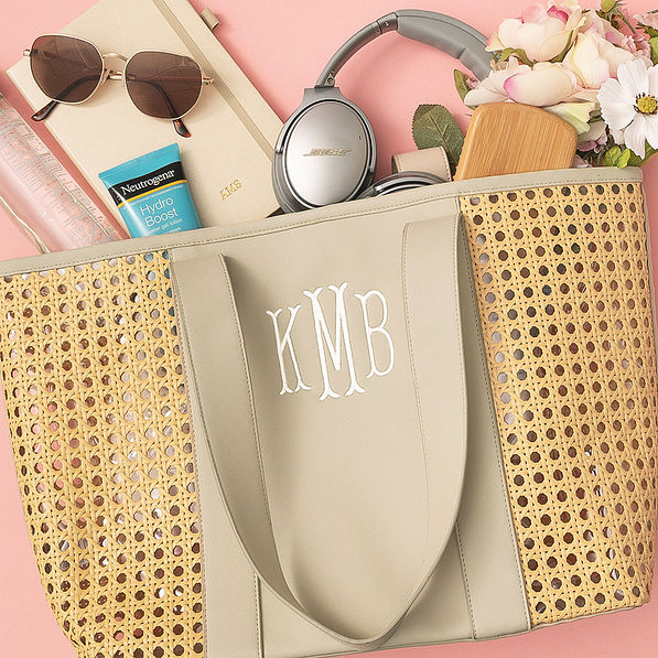 beige monogrammed caning tote bag packed