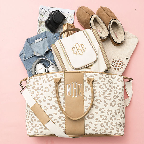 Leopard weekender in neutral leopard flatlay