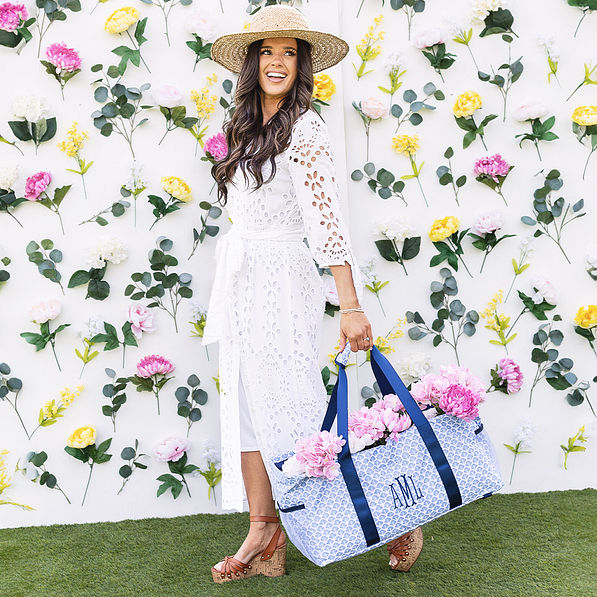 girl carrying personalized wire top extra large tote in blue shells