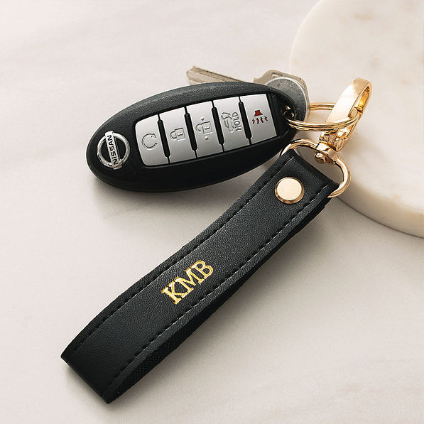 black classic keychain on white background