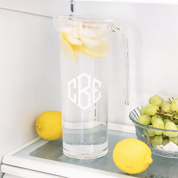 clear personalized acrylic pitcher with nesting cups in fridge