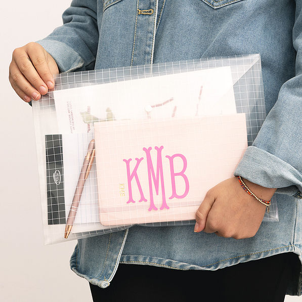 girl carrying personalized file document holder