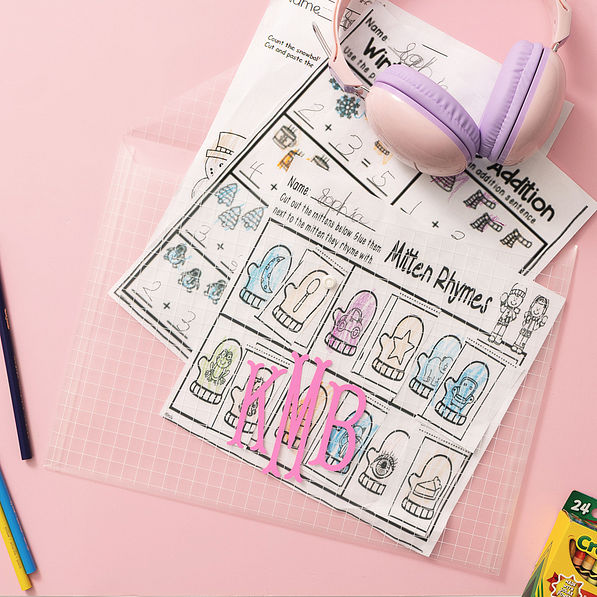 kids artwork in monogrammed file document holder