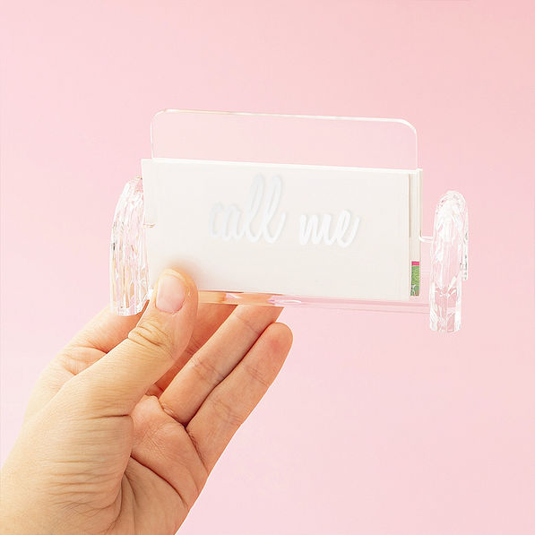 Girl holding personalized business card holder stand phrase