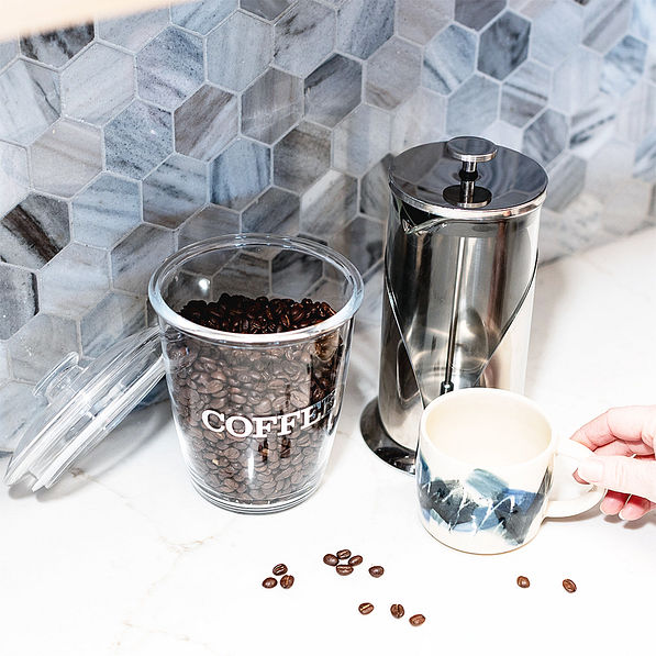 clear container with coffee