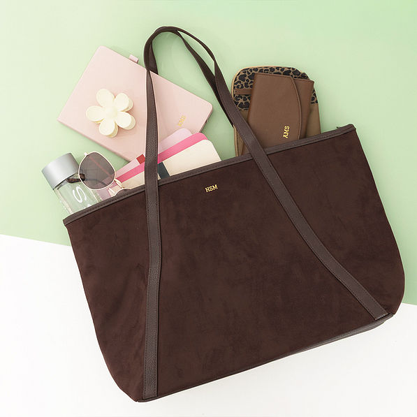 brown suede tote flatlay