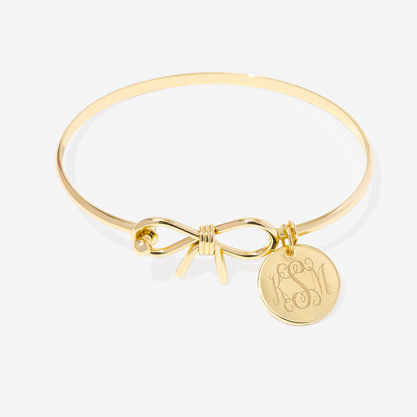 Monogrammed bow bangle in gold