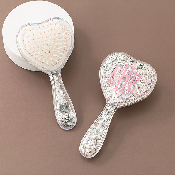 pink purse brush on brown background