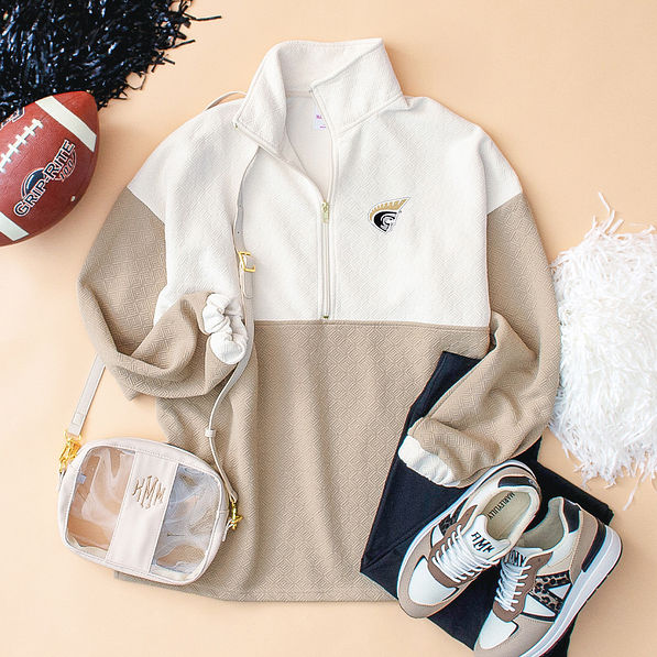 Flatlay of the Quilted Pullover Tunic surrounded by items