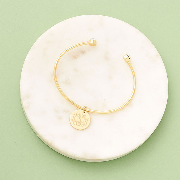 rhinestone cuff bangle on marble dish