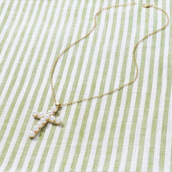 Pearl Cross Necklace nm on green stripes