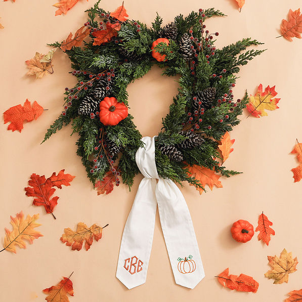pumpkin wreath sash with fall leaves