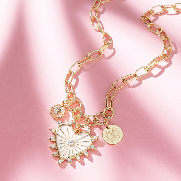 Charm heart necklace on pink